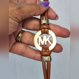 MICHAEL KORS Gold Tone MK Logo Crystals Camel Brown Saffiano Leather Bracelet